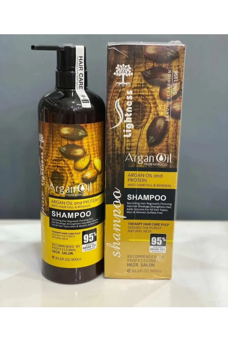 فاقد سولفات و بدون آسیب به موها و پوسته کف سرمناسب برای انواع موها حتی موهای کراتین شده Shampoo Argan Oil 900 ML لایت نس Lightness شامپو بدون سولفات روغن آرگان